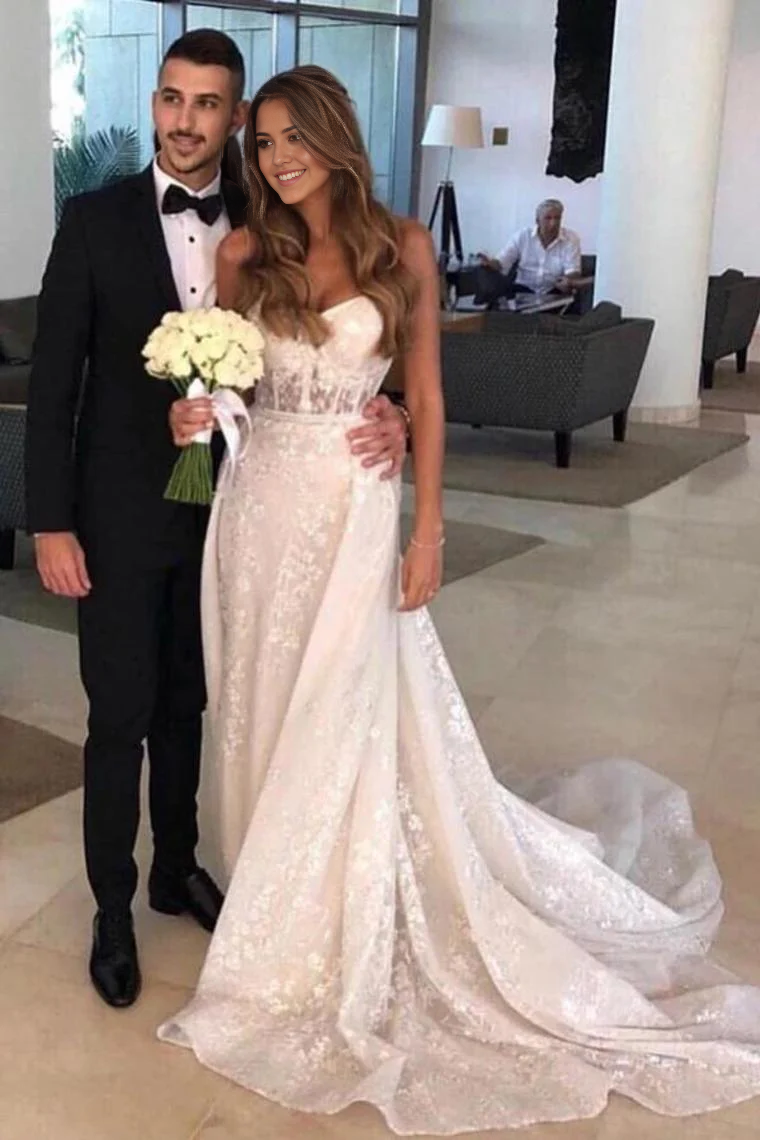 Vestidos de novia de tul sin mangas con escote en forma de corazón y apliques